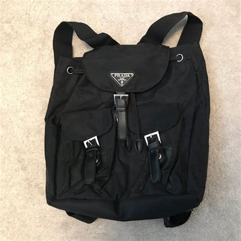 90s prada backpack.